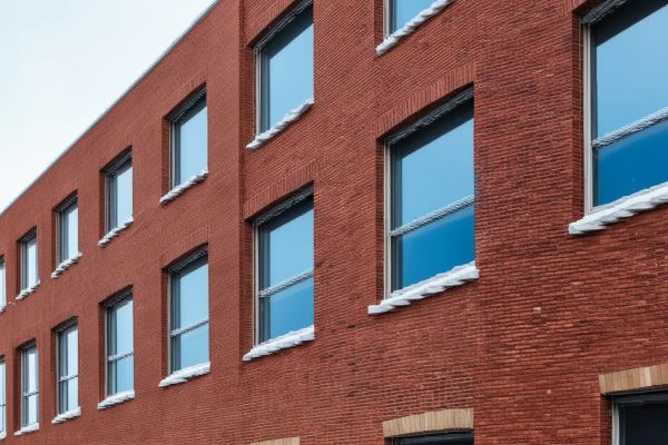 Retail shopping center with attractive brick storefront design and professional signage